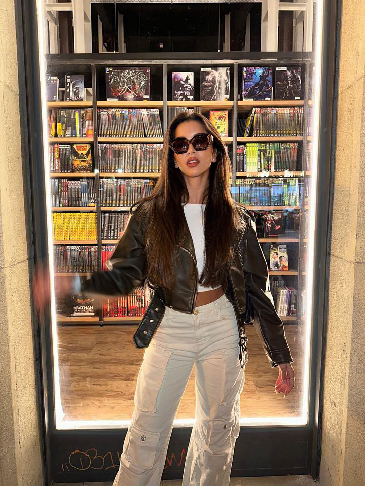 Woman wearing EYENEED eyewear in an urban setting